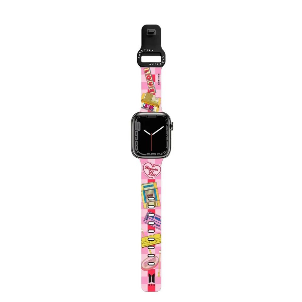 pink checkered smartwatch band with BTS graphics