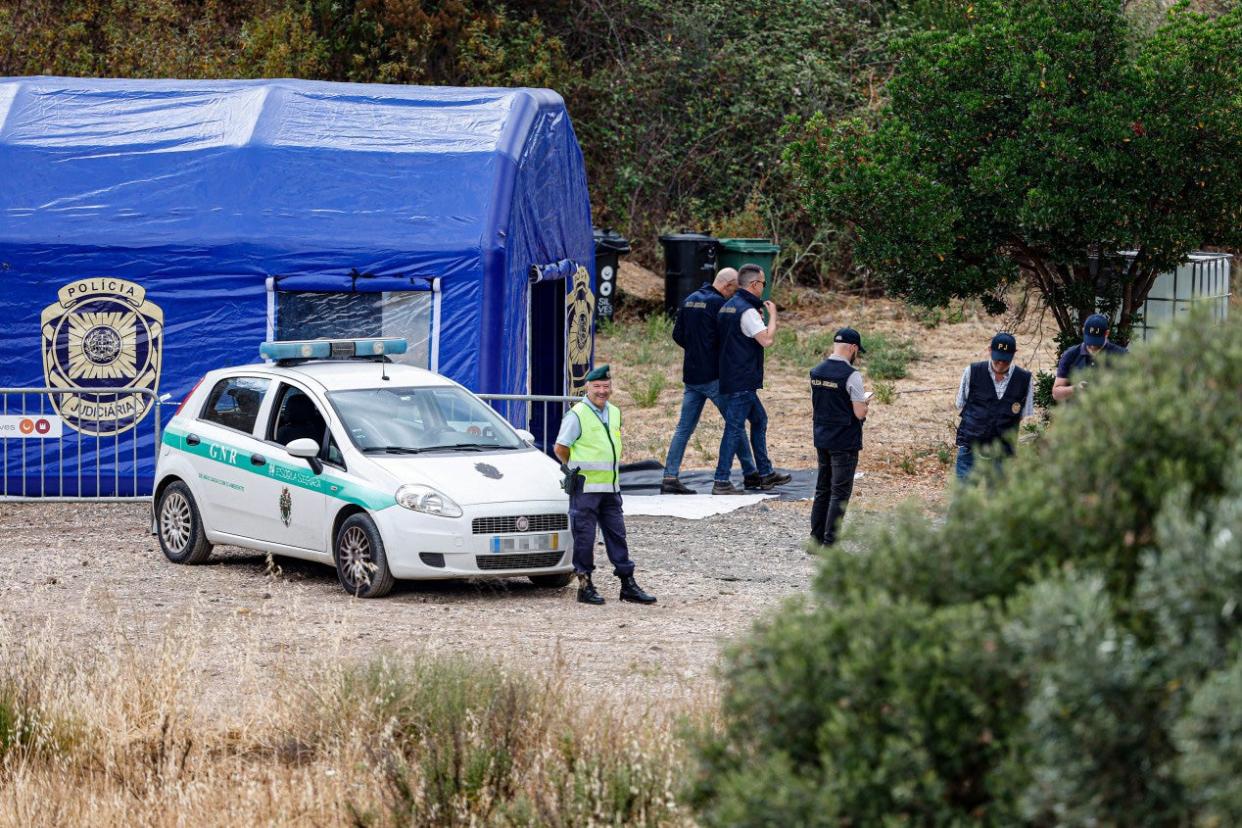 Portuguese authorities are gathering at a makeshift Judiciary Police base camp near the Arade dam (EPA)