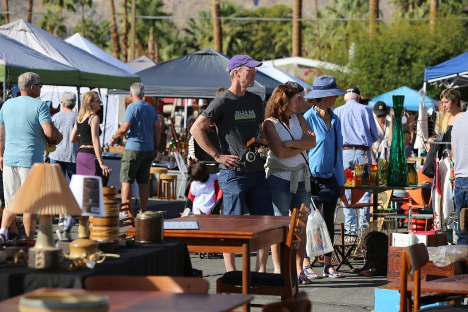 People shop for vintage items at the Palm Springs Vintage Market held outside the Palm Springs Cultural Center in Palm Springs, Calif., on Sunday, November 3, 2019. 