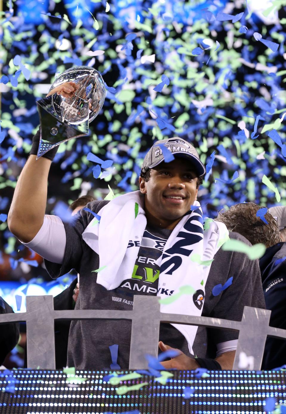 Feb. 2, 2014: Seattle Seahawks quarterback Russell Wilson celebrates with the Vince Lombardi Trophy after winning Super Bowl XLVIII against the Denver Broncos at MetLife Stadium. Seattle Seahawks won the game, 43-8.