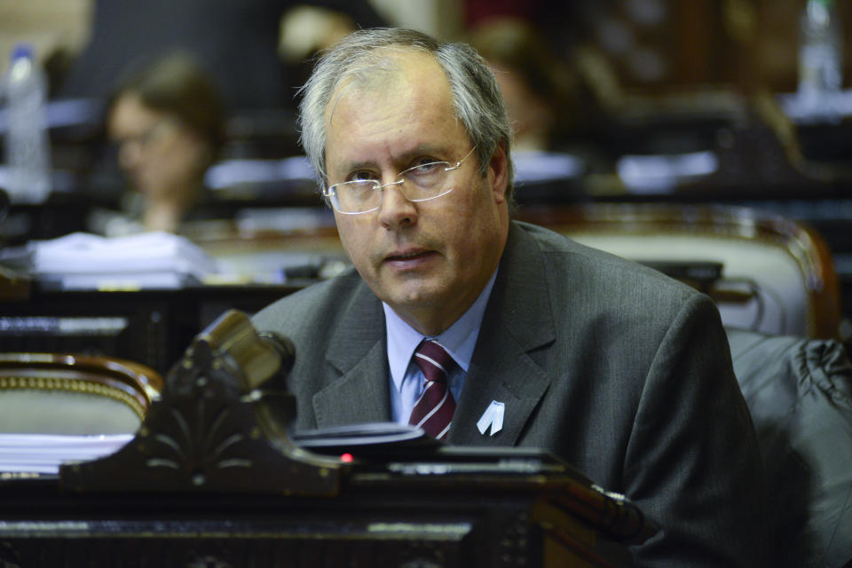 FILE - In this May 18, 2016 file photo provided by the Nation's Honorable Chamber of Deputies, lawmaker Hector Olivares attends a congressional commission session in Buenos Aires, Argentina. Argentine Senate President Federico Pinedo confirmed on May 12, 2019 that Olivares died after he was seriously injured in a May 9 shooting near the congressional building in Buenos Aires. (Nation's Honorable Chamber of Deputies, HCDN via AP, File)