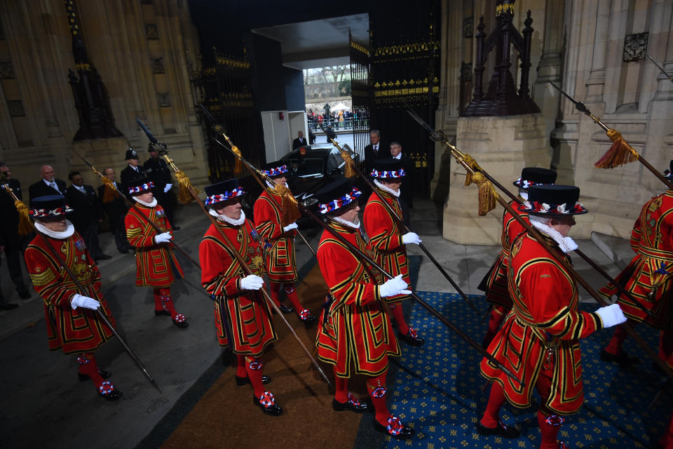 Yeoman warders parade through the Sovereign's entrance ahead of the State Opening of Parliament by Queen Elizabeth II, in the House of Lords at the Palace of Westminster in London.