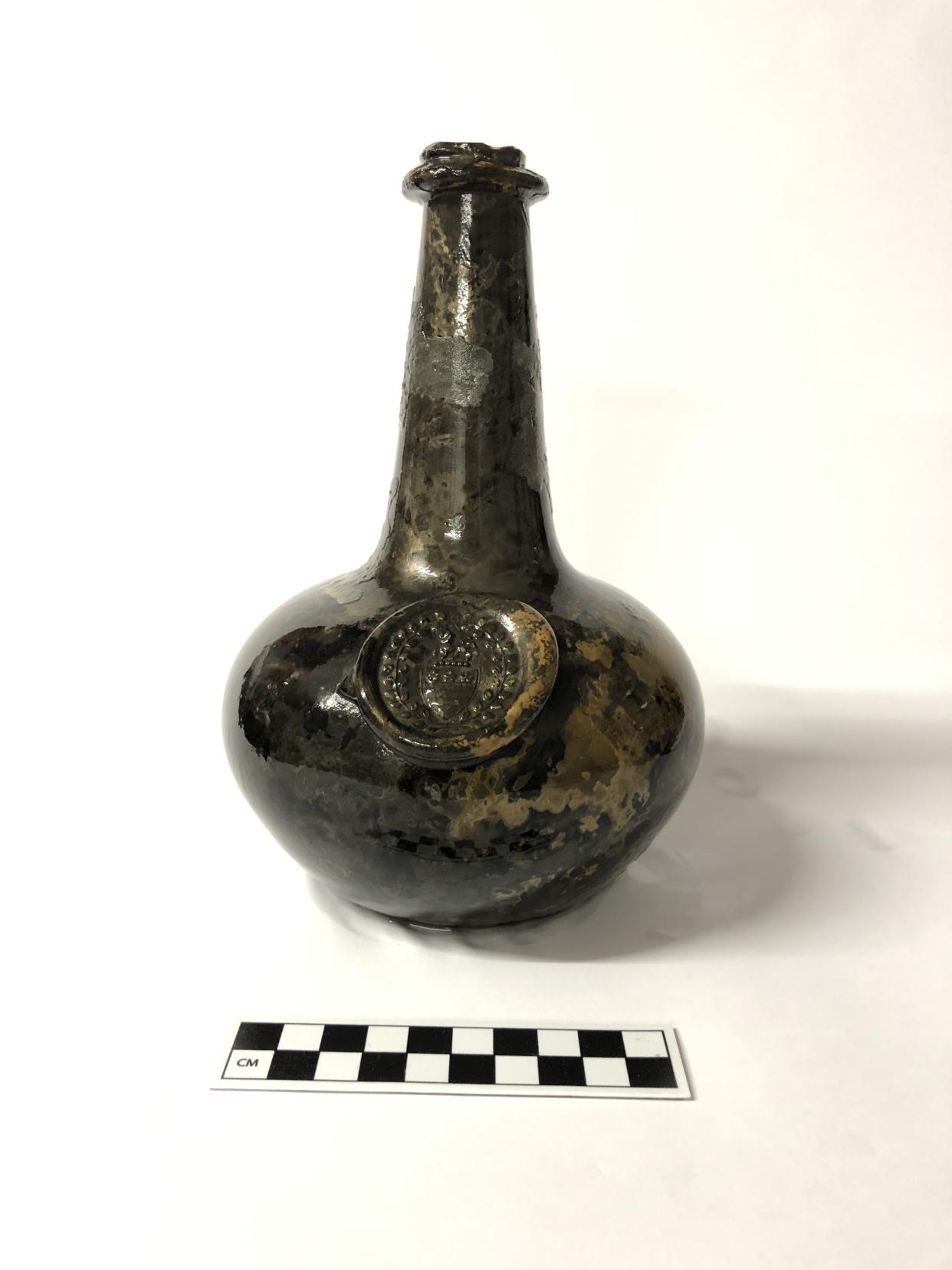 One of the bottles found with the wreck bears a glass seal with the crest of the Legge family - ancestors of George Washington, the first US President. (Norfolk Historic Shipwrecks/ PA)