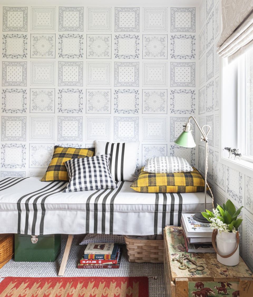 This image released by Portland Oregon-based interior designer Max Humphrey shows a room with a wallpaper design inspired by bandanas. (Christopher Dibble via AP)