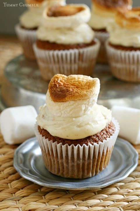 <p>The sweet potato pie gets reimagined as a cupcake in this recipe (complete with a toasted marshmallow on top!).</p><p><strong><a href="http://yummycrumble.com/sweet-potato-cupcakes-and-maple-walnut-frosting/" rel="nofollow noopener" target="_blank" data-ylk="slk:Get the recipe at Yummy Crumble.;elm:context_link;itc:0;sec:content-canvas" class="link ">Get the recipe at Yummy Crumble.</a></strong></p>