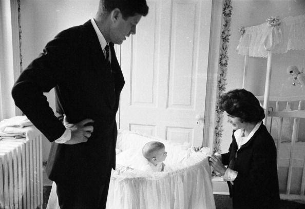 <p>Then U.S. Senator John F. Kennedy with his wife Jacqueline and their baby daughter, Caroline, in their Georgetown home. Caroline was born November 27, 1957.</p>