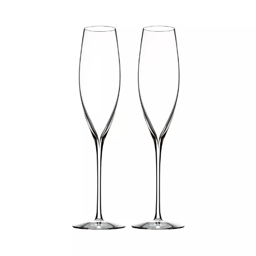 two glass champagne flutes against white background