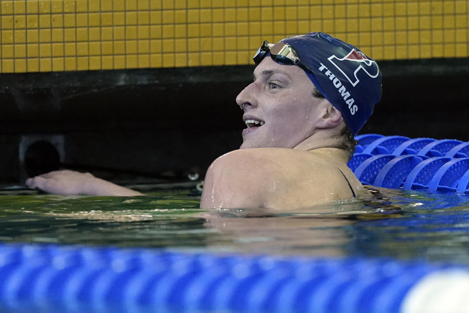 Pennsylvania's Lia Thomas smiles after winning a preliminary heat in the 500-yard freestyle at the NCAA women's swimming and diving championships Thursday, March 17, 2022, in at Georgia Tech in Atlanta. (AP Photo/John Bazemore)