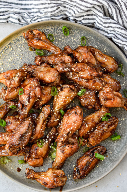 <p>Air fryer chicken wings are a quick way to get ultra crispy wings, but this version has a homemade stove top sweet chili sauce for those sticky sauce wing lovers!</p><p><strong>Get the recipe: <a href="https://mealplanaddict.com/2020/03/air-fryer-chicken-wings/" rel="nofollow noopener" target="_blank" data-ylk="slk:Air Fryer Chicken Wings;elm:context_link;itc:0;sec:content-canvas" class="link rapid-noclick-resp">Air Fryer Chicken Wings</a></strong></p>