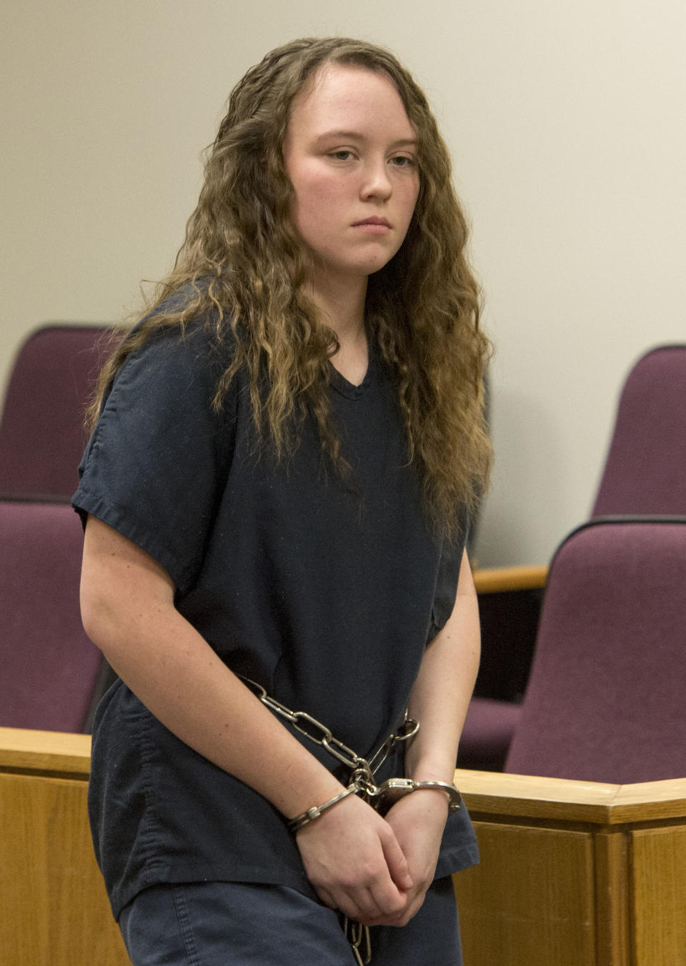 File- This April 17, 2014, file photo shows Meagan Grunwald, entering the courtroom after a recess in her preliminary hearing in Judge Darold McDade's courtroom in Provo, Utah. The 17-year-old girl has pleaded not guilty to a dozen charges she faces stemming from a crime spree that left a Utah deputy dead and another deputy injured. Grunwald appeared in a Provo courtroom Monday, May 12, 2014, to enter her plea to charges of murder, attempted murder and other counts. She is being charged as an adult. (AP Photo/The Salt Lake Tribune, Rick Egan,Pool, File)