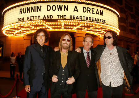 FILE PHOTO: Members of the group "Tom Petty and the Heartbreakers" Ron Blair, Tom Petty, Benmont Tench and Mike Campbell pose at the premiere of the documentary film from director Peter Bogdanovich "Runnin' Down a Dream: Tom Petty and the Heartbreakers" at Warner Bros. studios in Burbank, California, U.S., October 2, 2007. REUTERS/Fred Prouser/File Photo