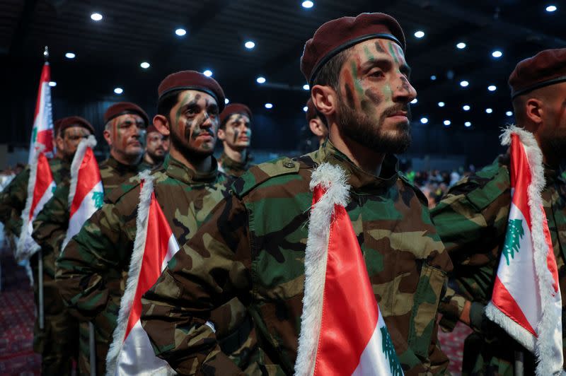 Hezbollah members parade during a rally marking al-Quds Day in Beirut's southern suburbs