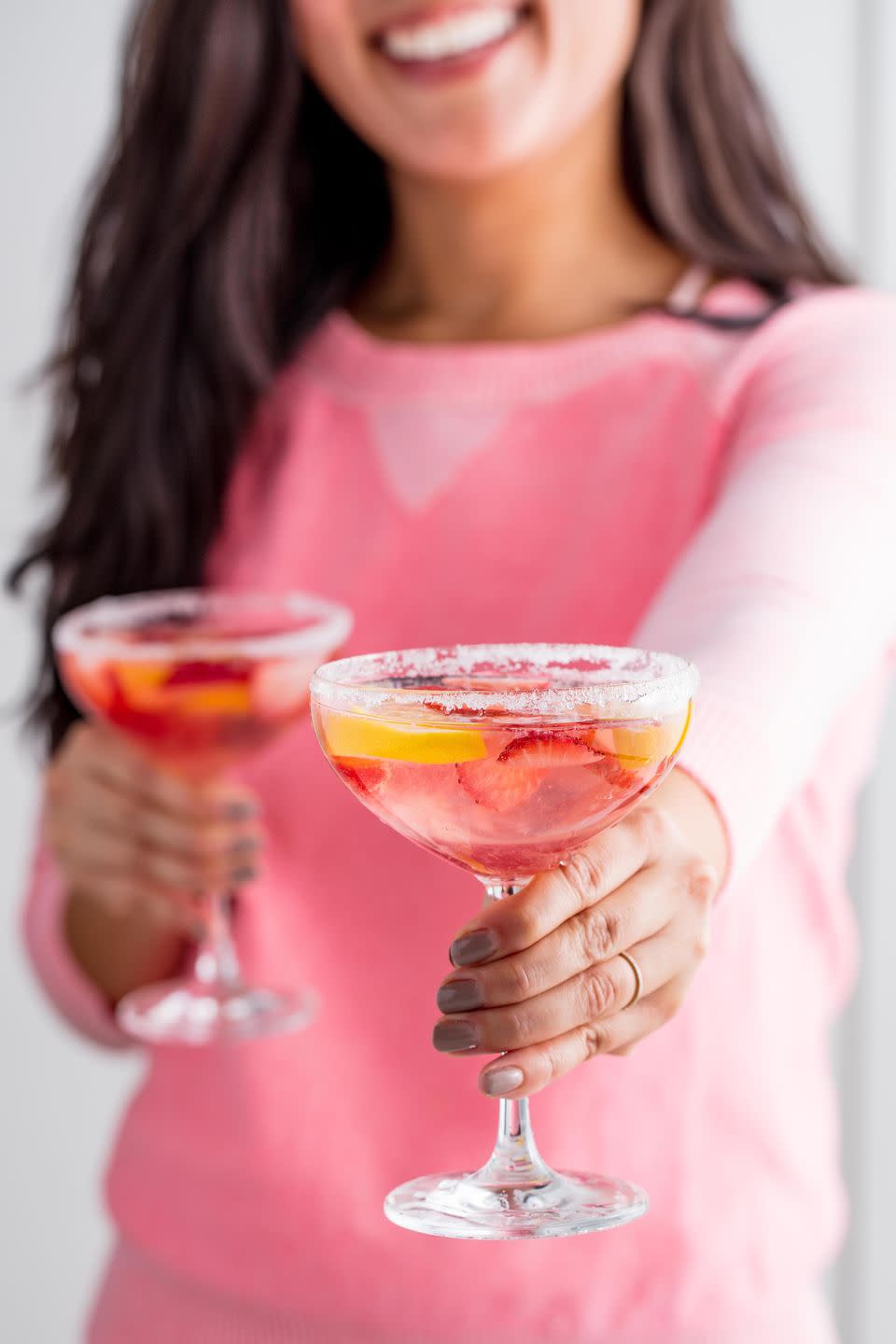 <p>Get ready to be giggling with your friends all night long once you've had a few of these extra-sweet <a href="https://www.delish.com/best-cocktail-recipes/" rel="nofollow noopener" target="_blank" data-ylk="slk:cocktails;elm:context_link;itc:0;sec:content-canvas" class="link ">cocktails</a>. This fruity drink is filled with wine, lemonade, and <a href="https://www.delish.com/entertaining/g2173/vodka-mixed-drinks-recipes/" rel="nofollow noopener" target="_blank" data-ylk="slk:vodka;elm:context_link;itc:0;sec:content-canvas" class="link ">vodka</a>, which is pretty much the most delicious, irresistible drink combo. This punch makes up to 8 servings, so it's ideal to get the party started for a crowd.</p><p>Get the <strong><a href="https://www.delish.com/cooking/recipe-ideas/a54556/giggle-juice-recipe/" rel="nofollow noopener" target="_blank" data-ylk="slk:Giggle Juice recipe;elm:context_link;itc:0;sec:content-canvas" class="link ">Giggle Juice recipe</a></strong>. </p>