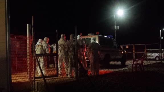 An ambulance at the center where the woman who simultaneously had Ebola and a stroke received care.