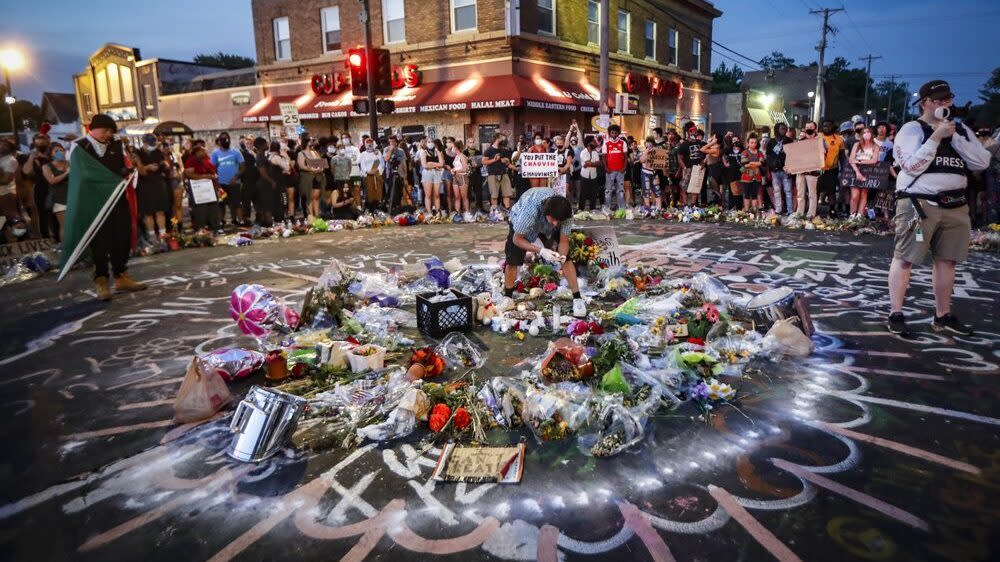 Protesters gather at a memorial for George Floyd, June 1, 2020, in front of Cup Foods in Minneapolis. Floyd was killed May 25 while in police custody outside the store. (AP Photo/John Minchillo, File)