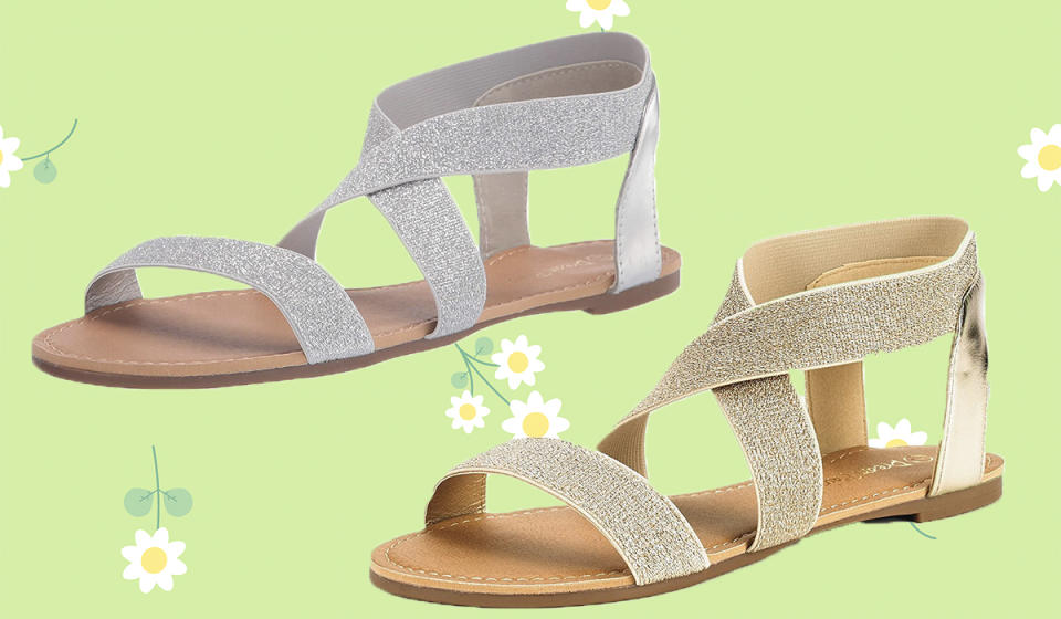 sandals in silver and gold on green background with daisies