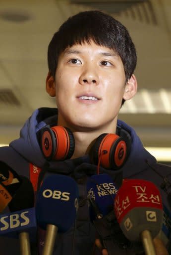 South Korean swimmer Park Tae-Hwan addresses the media as he arrives at Heathrow airport. Sun Yang is geared to lower the world record in his Olympic duel with Asian rival Park in the 400m freestyle at the London Games, his Australian coach Denis Cotterell said Thursday