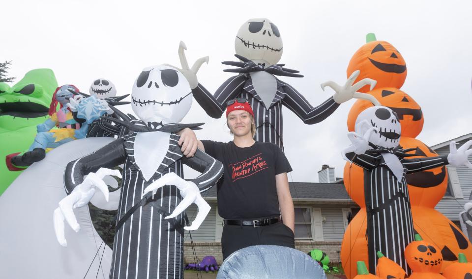 Ryan Downey, 15, is the mastermind behind a Halloween yard decoration that features more than 150 inflatables at 10047 Strausser St. NW in Jackson Township.