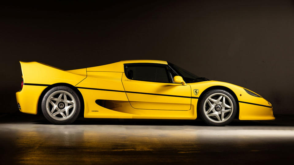 The 1997 Ferrari F50 in Giallo Modena from the side