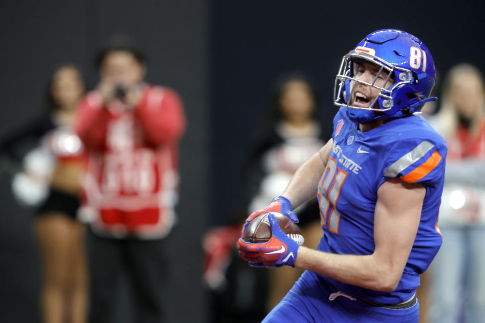 Boise State wide receiver Austin Bolt (81) celebrates as he runs into the end zone for a touchdown during the first half of the Mountain West championship game against UNLV Saturday, Dec. 2, 2023, in Las Vegas. (Steve Marcus/Las Vegas Sun via AP)