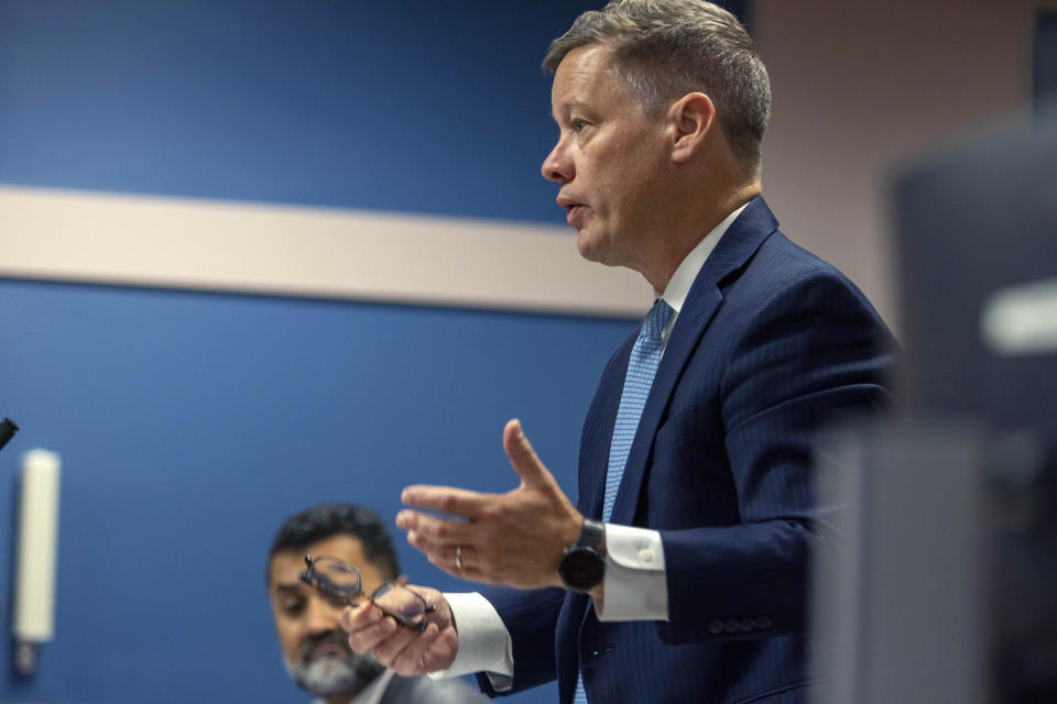 Attorney Brian Rafferty, who is representing defendant Sidney Powell, speaks to Fulton County Superior Judge Scott McAfee during a jury questionnaire hearing at the Fulton County Courthouse on Monday, Oct. 16, 2023, in Atlanta. (Alyssa Pointer/Pool Photo via AP)