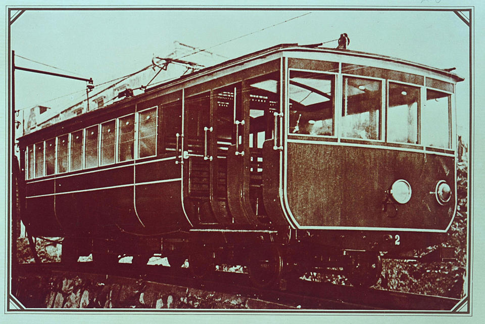 In this undated photo provided by Hong Kong Peak Tramways, a 2nd generation Peak Tram which serviced from 1926 to 1948 is seen in Hong Kong. The Peak Tram started operations in 1888, when Hong Kong was a British colony, to transport people up Victoria Peak instead of using sedan chairs. The original carriages were made of varnished timber and seated 30 passengers in three classes. (Hong Kong Peak Tramways via AP)