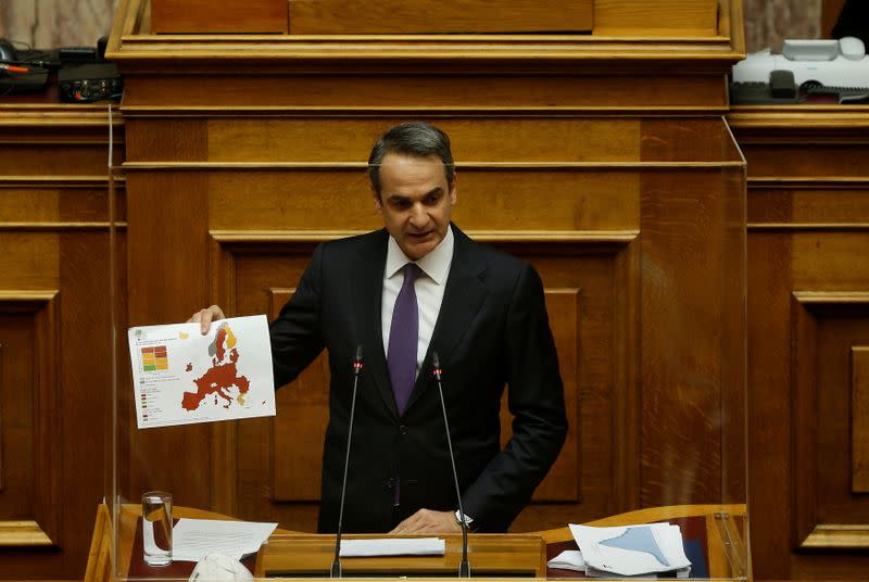 Greek PM Kyriakos Mitsotakis addresses lawmakers on his government's handling of the coronavirus disease (COVID-19) pandemic