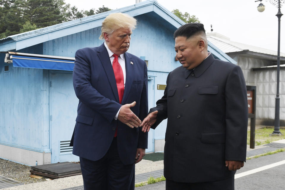 FILE - In this June 30, 2019 file photo, President Donald Trump meets with North Korean leader Kim Jong Un at the border village of Panmunjom in the Demilitarized Zone, South Korea. North Korea on Thursday fired two unidentified projectiles into the sea, South Korea's military said, three days after the North said its troops conducted artillery drills near its disputed sea boundary with South Korea. (AP Photo/Susan Walsh, File)