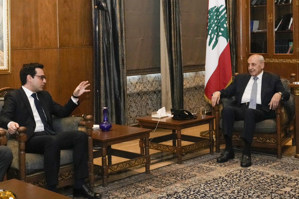 French Foreign Minister Stephane Sejourne, left, speaks with Parliament Speaker Nabih Berri during their meeting in Beirut, Lebanon, Sunday, April 28, 2024. (AP Photo/Hassan Ammar)