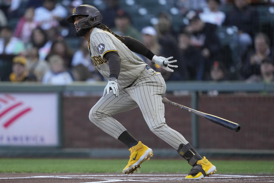 San Diego Padres' Fernando Tatis Jr. watches his double during the first inning of a baseball game against the San Francisco Giants in San Francisco, Monday, June 19, 2023. (AP Photo/Jeff Chiu)