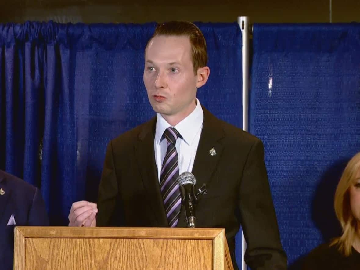 Conservative Member of Parliament for St. Albert-Edmonton, Michael Cooper, is seen in 2017. Cooper has been criticized for a photo of him giving an interview at an Ottawa protest while a person carrying a flag with a Nazi symbol is in the background. (CBC - image credit)