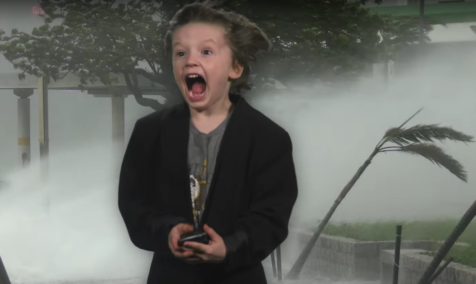 6-year-old Carden Corts battles a hurricane – thanks to a greenscreen – in his hilarious viral weather report. (Photo: YouTube)