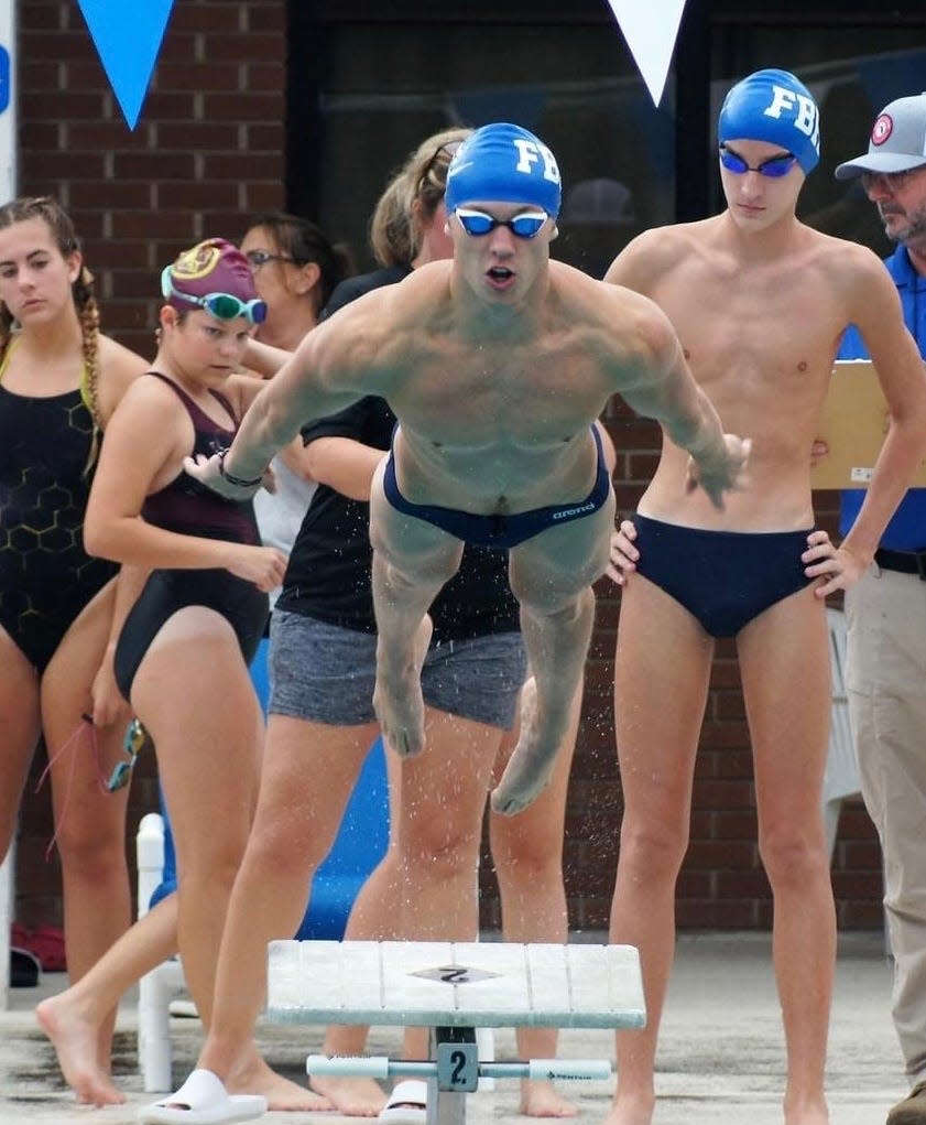 Fernandina Beach's Nate Janzow set a school boys swimming record last week in the 100-yard breaststroke.