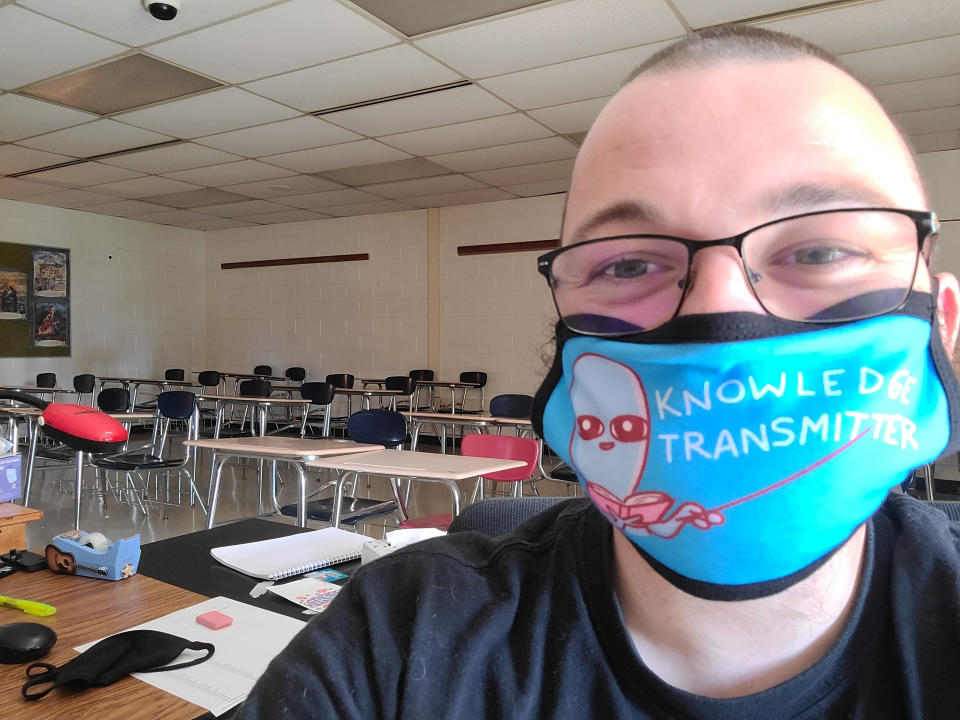 This June 2020 selfie photo shows Bill Mathis of Romeo, Mich., in one of the rooms where he taught high school English. It was his dream job, the one he referenced in a childhood journal he still keeps: “I would love to be a teacher,” he scrawled in pencil as a third grader. But stress over teaching during a pandemic put Mathis, 29, over the edge, and he resigned in November 2020. (AP Photo via Bill Mathis)