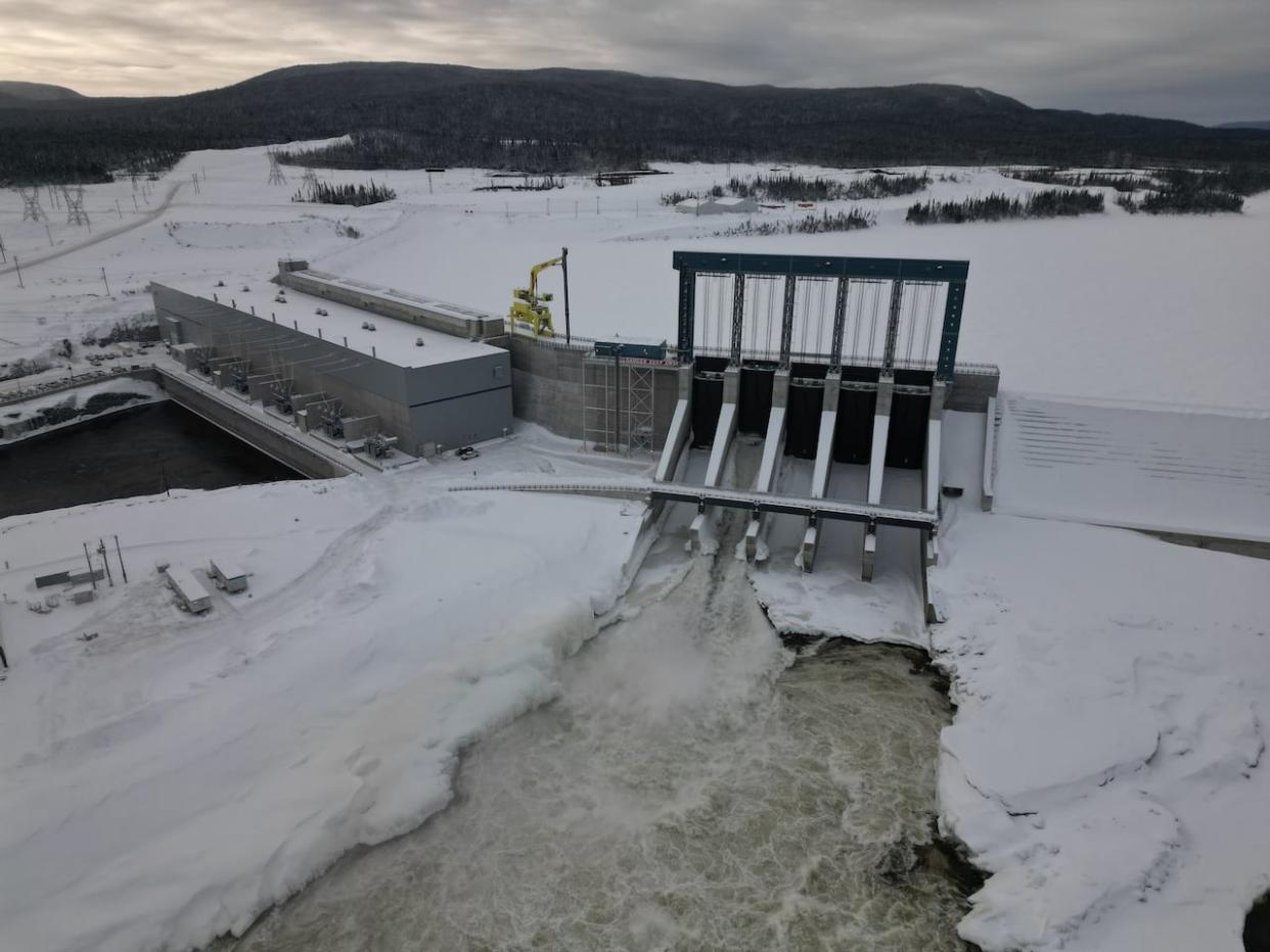 The Muskrat Falls dam on Labrador’s Churchill River is pictured in January. The project’s 1,100 kilometres of transmission lines still don’t work as designed. (Danny Arsenault/CBC - image credit)