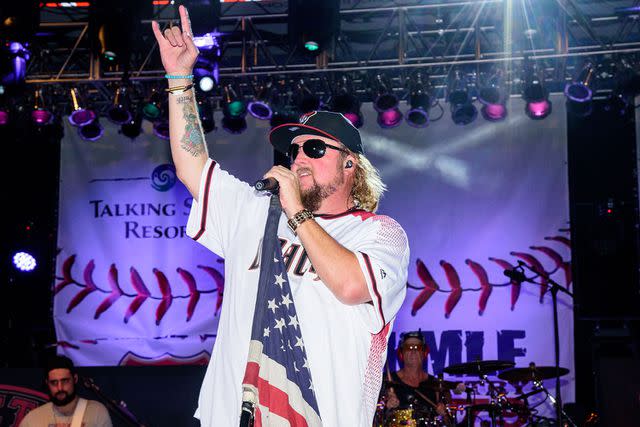 <p>Sarah Sachs/Arizona Diamondbacks/Getty</p> Colt Ford performs onstage at a March 2017 concert in Scottsdale, Arizona