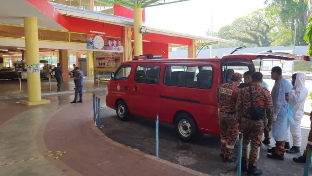 The Fire and Rescue Department personnel arriving at the Tanjung Bungah wet market complex to sanitise the area January 20, 2021. — Picture from Facebook/Zairil Khir Johari