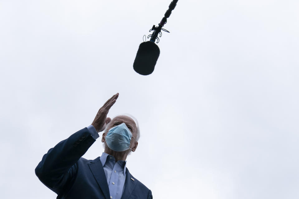 Democratic presidential candidate former Vice President Joe Biden speaks to media before boarding his campaign plane at New Castle Airport, in New Castle, Del., Monday, Oct. 12, 2020, en route to Ohio. (AP Photo/Carolyn Kaster)