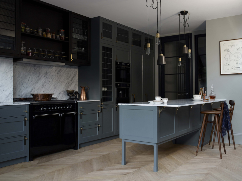 Chic kitchen space decked out in Buster + Punch fixtures.