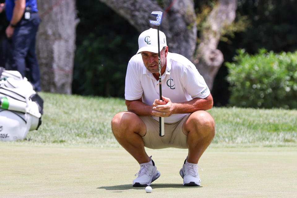 Richard Bland lines up a putt