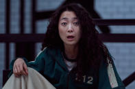 <p>Player 212 brings her own type of chaos to the game. The cigarette smuggling, loud-mouth bully meets her death while seeking revenge.</p> <p>Kim was selected to play the role of Han by director Hwang Dong-hyuk, having previously worked with him on the movie <em>Silenced</em> in 2011. She compared her character to "riding a rollercoaster" during an interview with <a href="https://entertain.naver.com/read?oid=109&aid=0004488438" rel="nofollow noopener" target="_blank" data-ylk="slk:OSEN;elm:context_link;itc:0;sec:content-canvas" class="link "><em>OSEN</em></a> in October. "She is a changeable and ugly beauty, but on the inside, she is lonelier than anyone and fears people more than anyone else."</p>