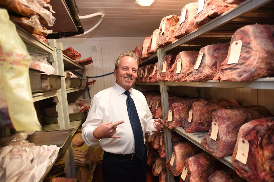 John Campbell, Co-owner of The River Palm Terrace, is seen inside of the meat locker at The River Palm Terrace in Edgewater, Thursday on 04/14/22.