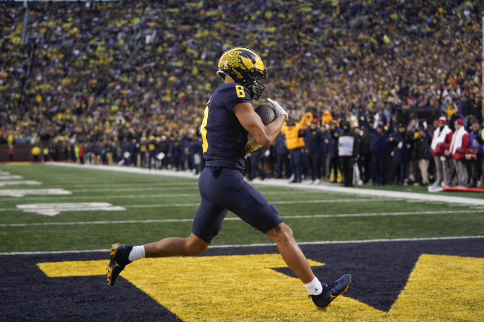 Michigan wide receiver Ronnie Bell (8) catches a nine-yard touchdown pass against Nebraska in the first half of an NCAA college football game in Ann Arbor, Mich., Saturday, Nov. 12, 2022. (AP Photo/Paul Sancya)
