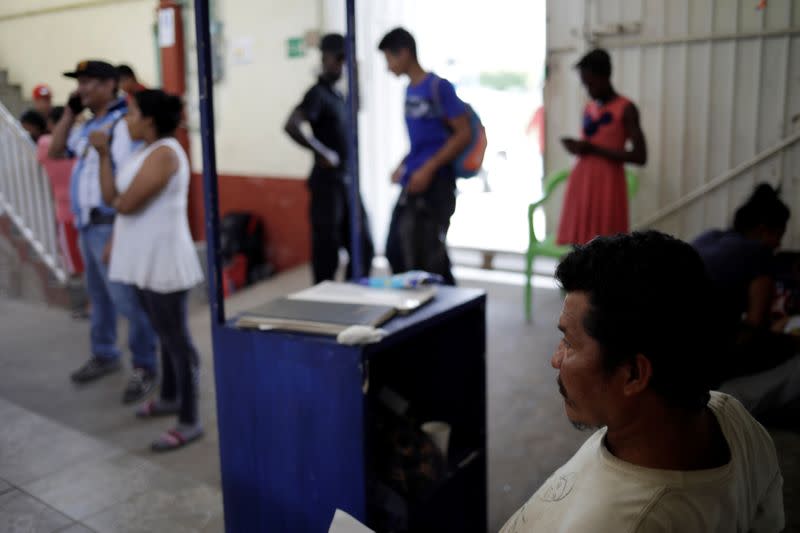 Guatemalan migrant Wilfredo Gomez sits at a shelter in Tapachula