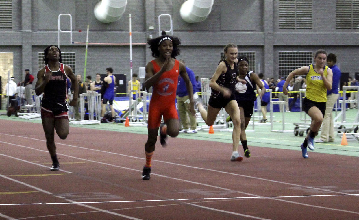 Image: Bloomfield High School transgender athlete Terry Miller, second from left, wins the final of the 55-meter dash over transgender athlete Andraya Yearwood, far left, and other runners in the Connecticut girls Class S indoor track meet at Hillhouse Hi (Pat Eaton-Robb / AP file)