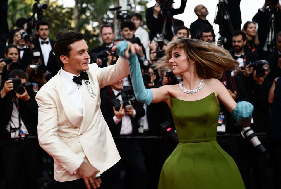 Rupert Friend and Maya Hawke on the "Asteroid City" red carpet at the Cannes Film Festival.