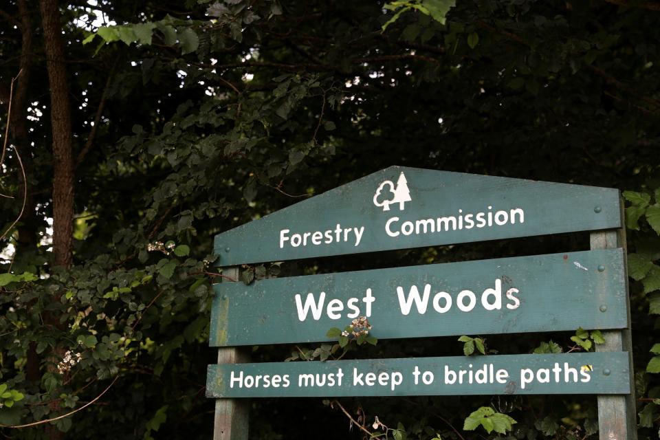 A sign displays the entrance to West Woods on the edge of Wiltshire's Marlborough Downs (REUTERS)