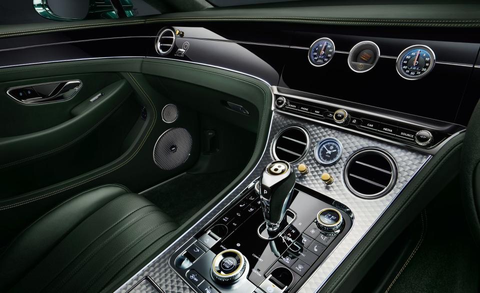 <p>The dashboard and center console feature the familiar engine-turned finish, often referred to as "turned aluminum," that was utilized in the early days of the automobile to minimize unwanted light reflection.</p>