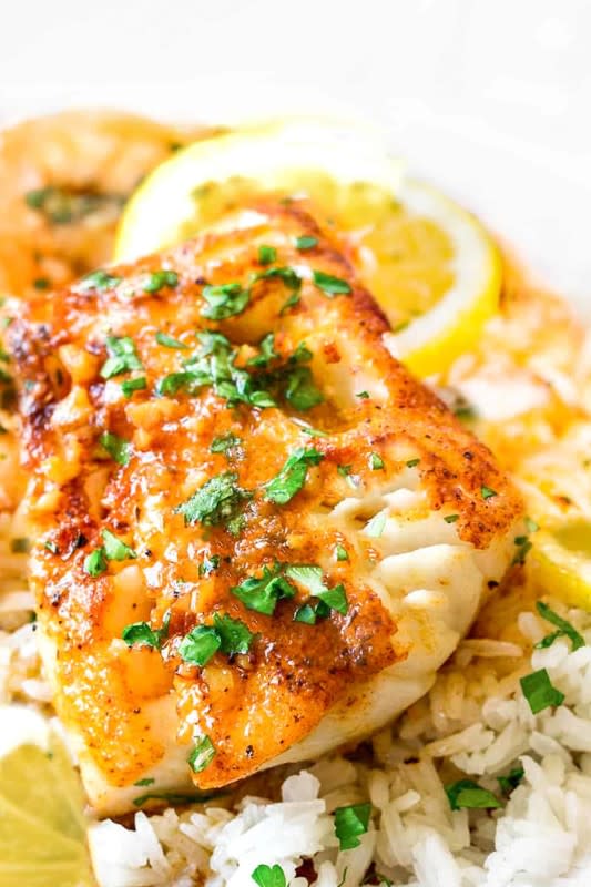 Erren's Kitchen<p>Cod fillets in a delicious simple garlic butter sauce. Mouthwatering and easy to make too!</p><p><strong>Get the recipe: <a href="https://www.errenskitchen.com/garlic-butter-cod-fillets/" rel="sponsored" target="_blank" data-ylk="slk:Garlic Butter Cod Fillets;elm:context_link;itc:0;sec:content-canvas" class="link "><em>Garlic Butter Cod Fillets</em></a></strong></p>