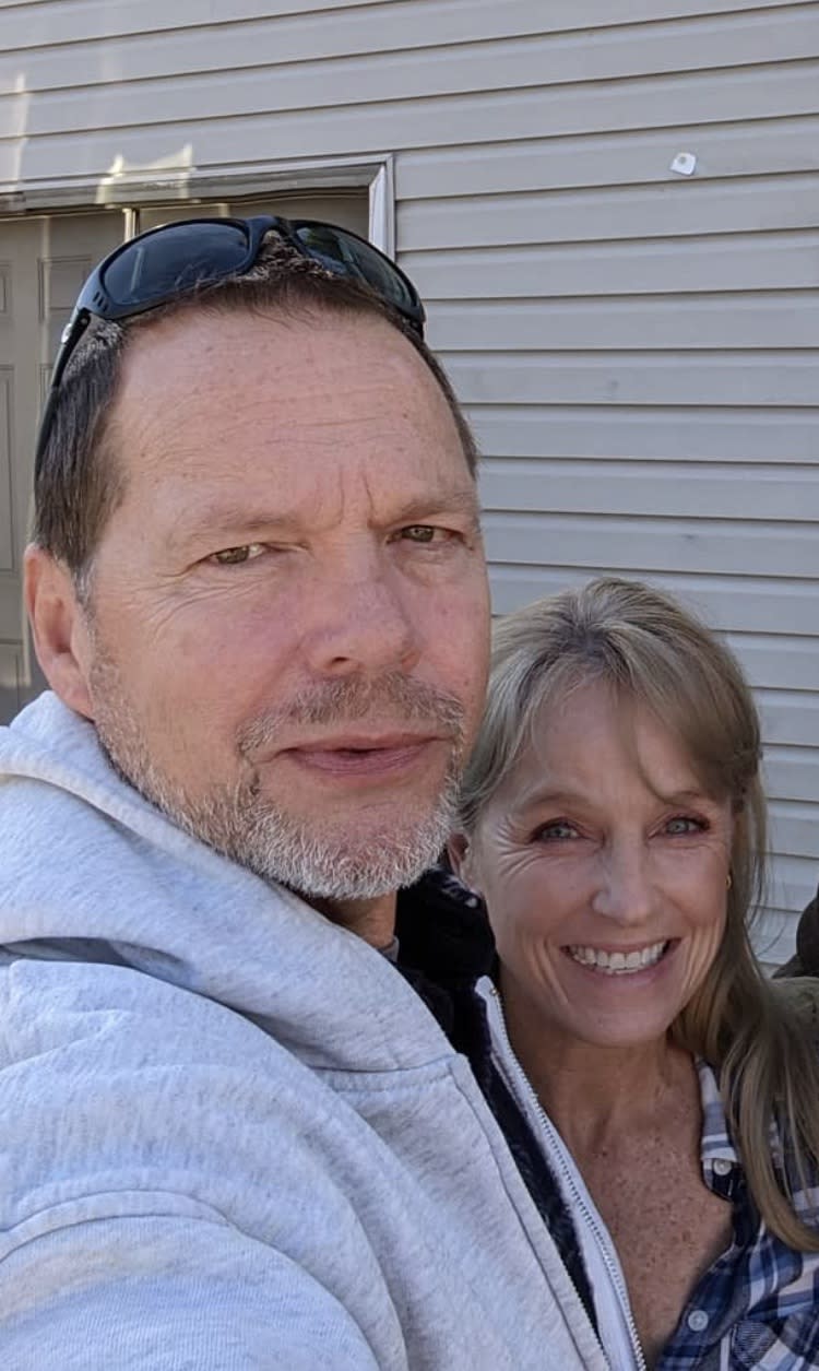 Karen E. Laine and husband Roger Rominger pose for a selfie 